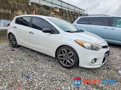 Czwarte zdjęcie samochodu z boku: 2015 KIA FORTE5 SX VIN:KNAFZ5A36F5269070 - miniatura
