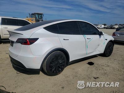Trzecie zdjęcie samochodu z tyłu: 2021 TESLA MODEL Y VIN:5YJYGDED9MF109579 - miniatura