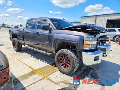 Czwarte zdjęcie samochodu z boku: 2015 CHEVROLET SILVERADO K2500 HEAVY DUTY LT VIN:1GC1KVEG1FF516780 - miniatura
