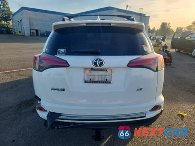 Zdjęcie 6 z 14 samochodu: 2018 TOYOTA RAV4 LE VIN:JTMZFREVXJJ750936 - miniatura