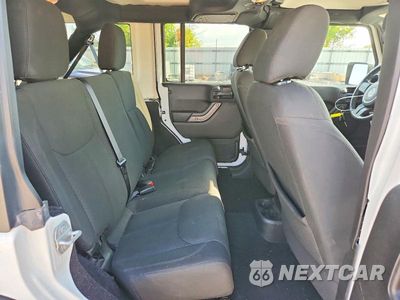 Zdjęcie 10 z 12 samochodu: 2016 JEEP WRANGLER UNLIMITED SPORT VIN:1C4BJWDG5GL334047 - miniatura