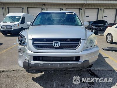 Piąte zdjęcie samochodu w środku: 2004 HONDA PILOT EX VIN:2HKYF18494H575558 - miniatura
