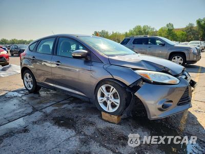 Czwarte zdjęcie samochodu z boku: 2014 FORD FOCUS SE VIN:1FADP3K22EL431027 - miniatura
