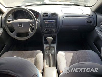 Zdjęcie 8 z 12 samochodu: 2000 MAZDA PROTEGE ES VIN:JM1BJ2238Y0239347 - miniatura