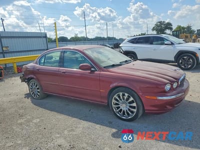 Czwarte zdjęcie samochodu z boku: 2003 JAGUAR X-TYPE 3.0 VIN:SAJEA51C43WD41383 - miniatura