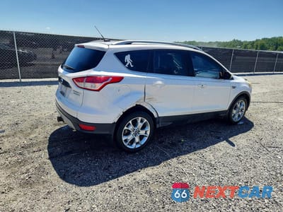 Trzecie zdjęcie samochodu z tyłu: 2014 FORD ESCAPE TITANIUM VIN:1FMCU0J94EUE20287 - miniatura
