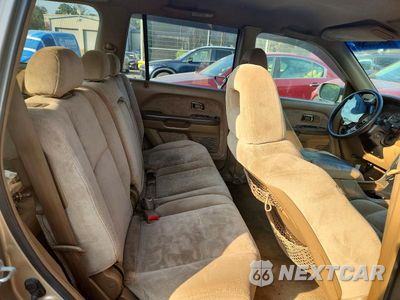Zdjęcie 11 z 14 samochodu: 2004 HONDA PILOT EX VIN:2HKYF18454H614677 - miniatura
