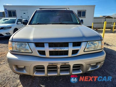 Piąte zdjęcie samochodu w środku: 2004 ISUZU RODEO S VIN:4S2CK58W244314149 - miniatura