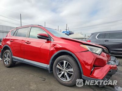 Czwarte zdjęcie samochodu z boku: 2017 TOYOTA RAV4 XLE VIN:2T3RFREVXHW654722 - miniatura