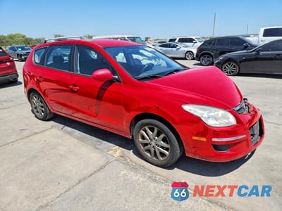 Czwarte zdjęcie samochodu z boku: 2012 HYUNDAI ELANTRA TOURING GLS VIN:KMHDC8AE4CU156116 - miniatura