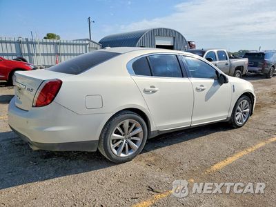Trzecie zdjęcie samochodu z tyłu: 2012 LINCOLN MKS VIN:1LNHL9DR1CG804869 - miniatura