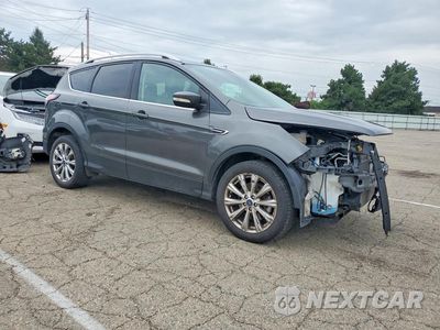 Czwarte zdjęcie samochodu z boku: 2018 FORD ESCAPE TITANIUM VIN:1FMCU9J92JUB71146 - miniatura