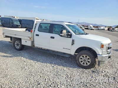 Czwarte zdjęcie samochodu z boku: 2022 FORD F350 SUPER DUTY VIN:1FT8W3BT2NEF83613 - miniatura