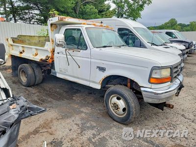 Czwarte zdjęcie samochodu z boku: 1997 FORD F350 SUPER DUTY DUMP TRUCK VIN:3FEKF38F3VMA60741 - miniatura