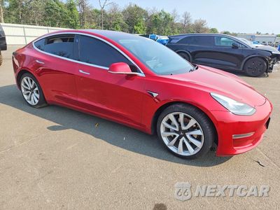 Czwarte zdjęcie samochodu z boku: 2018 TESLA MODEL 3 VIN:5YJ3E1EB2JF147552 - miniatura