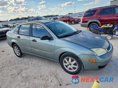 Czwarte zdjęcie samochodu z boku: 2005 FORD FOCUS ZX4 VIN:1FAFP34NX5W272448 - miniatura
