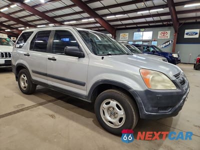 Czwarte zdjęcie samochodu z boku: 2002 HONDA CR-V VIN:JHLRD68422C021023 - miniatura