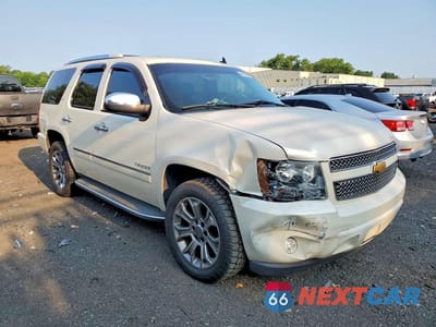 Czwarte zdjęcie samochodu z boku: 2014 CHEVROLET TAHOE K1500 LTZ VIN:1GNSKCE02ER141529 - miniatura