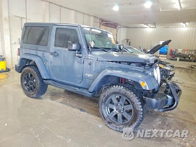 Czwarte zdjęcie samochodu z boku: 2016 JEEP WRANGLER SAHARA VIN:1C4AJWBG4GL220393 - miniatura