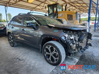 Czwarte zdjęcie samochodu z boku: 2023 TOYOTA RAV4 PRIME XSE VIN:JTMEB3FV0PD161665 - miniatura