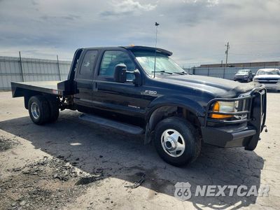 Czwarte zdjęcie samochodu z boku: 1999 FORD F350 SUPER DUTY VIN:1FTWX33F7XEC78060 - miniatura