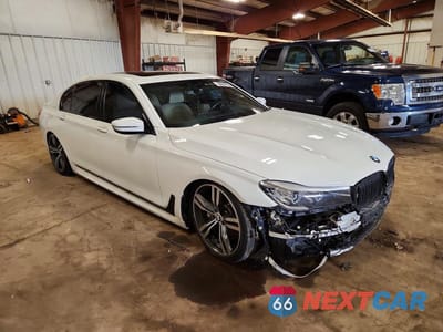 Czwarte zdjęcie samochodu z boku: 2017 BMW 740 I VIN:WBA7E2C39HG740616 - miniatura