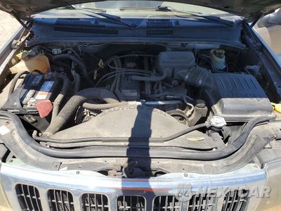Zdjęcie 12 z 13 samochodu: 2002 JEEP GRAND CHEROKEE LAREDO VIN:1J8GX48S12C121959 - miniatura