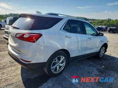 Trzecie zdjęcie samochodu z tyłu: 2018 CHEVROLET EQUINOX PREMIER VIN:3GNAXVEV6JS630558 - miniatura