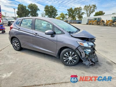 Czwarte zdjęcie samochodu z boku: 2019 HONDA FIT LX VIN:3HGGK5H44KM730119 - miniatura