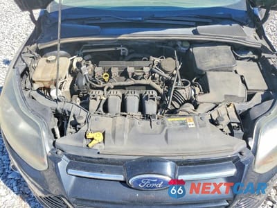 Zdjęcie 12 z 13 samochodu: 2013 FORD FOCUS TITANIUM VIN:1FADP3N23DL142166 - miniatura