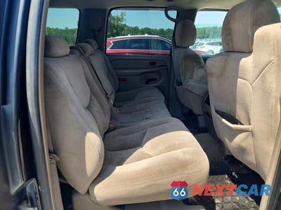 Zdjęcie 11 z 13 samochodu: 2004 CHEVROLET SUBURBAN C1500 VIN:1GNEC16Z74J313207 - miniatura