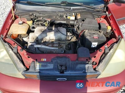 Zdjęcie 11 z 12 samochodu: 2004 FORD FOCUS LX VIN:1FAFP33P24W197357 - miniatura