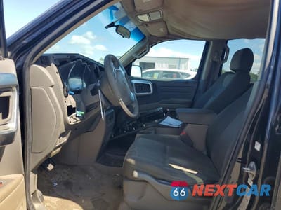 Zdjęcie 7 z 12 samochodu: 2006 HONDA RIDGELINE RT VIN:2HJYK16296H562202 - miniatura