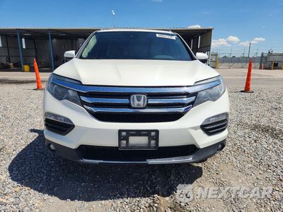 Piąte zdjęcie samochodu w środku: 2016 HONDA PILOT TOURING VIN:5FNYF5H90GB011528 - miniatura