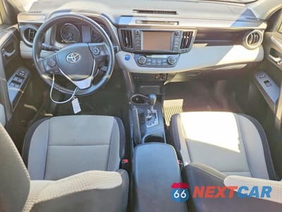 Zdjęcie 8 z 14 samochodu: 2018 TOYOTA RAV4 HYBRID XLE VIN:JTMRJREVXJD158188 - miniatura