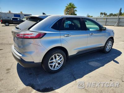 Trzecie zdjęcie samochodu z tyłu: 2022 FORD EDGE SEL VIN:2FMPK4J93NBA33136 - miniatura