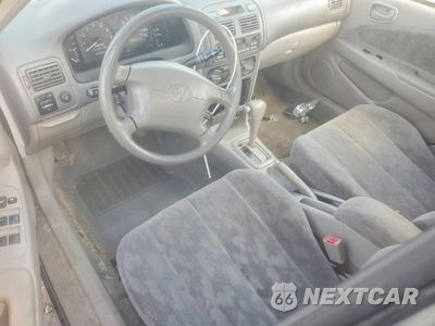 Zdjęcie 12 z 21 samochodu: 1999 TOYOTA COROLLA VE VIN:1NXBR12E0XZ216264 - miniatura
