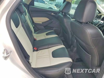 Zdjęcie 11 z 13 samochodu: 2013 FORD FOCUS TITANIUM VIN:1FADP3N27DL149511 - miniatura