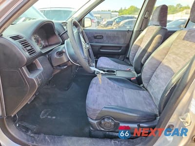 Zdjęcie 7 z 13 samochodu: 2002 HONDA CR-V LX VIN:JHLRD78472C021881 - miniatura