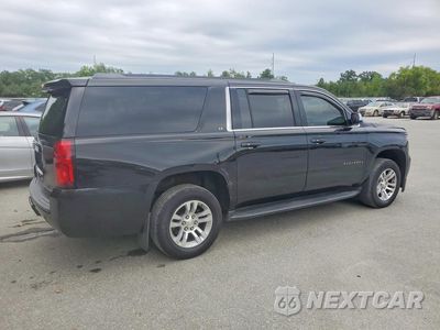 Trzecie zdjęcie samochodu z tyłu: 2017 CHEVROLET SUBURBAN K1500 LT VIN:1GNSKHKC6HR308121 - miniatura
