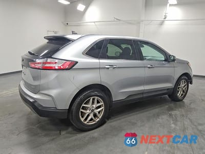 Trzecie zdjęcie samochodu z tyłu: 2024 FORD EDGE SEL VIN:2FMPK4J90RBA69730 - miniatura