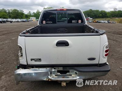 Zdjęcie 6 z 12 samochodu: 2001 FORD F150 VIN:1FTRW08L21KE75157 - miniatura