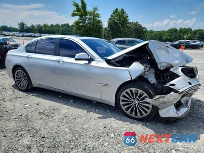 Czwarte zdjęcie samochodu z boku: 2012 BMW 740 I VIN:WBAKA4C58CDS99428 - miniatura
