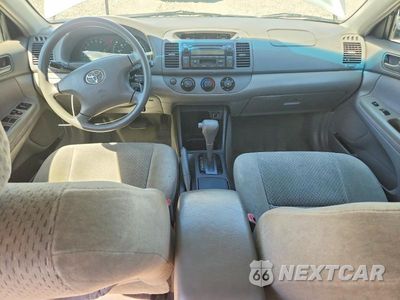 Zdjęcie 8 z 12 samochodu: 2004 TOYOTA CAMRY LE VIN:4T1BE32K94U899705 - miniatura