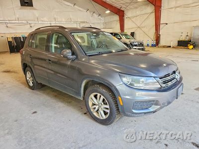Czwarte zdjęcie samochodu z boku: 2016 VOLKSWAGEN TIGUAN S VIN:WVGBV7AX1GW594311 - miniatura