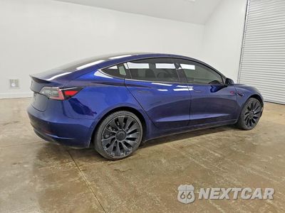 Trzecie zdjęcie samochodu z tyłu: 2018 TESLA MODEL 3 VIN:5YJ3E1EA2JF102585 - miniatura