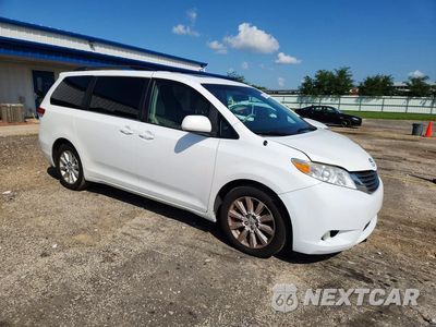 Czwarte zdjęcie samochodu z boku: 2014 TOYOTA SIENNA XLE 7-PASSENGER VIN:5TDDK3DC6ES082175 - miniatura
