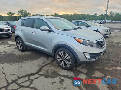 Czwarte zdjęcie samochodu z boku: 2012 KIA SPORTAGE EX VIN:KNDPC3A21C7333892 - miniatura