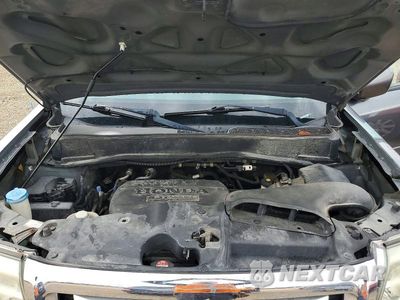 Zdjęcie 12 z 13 samochodu: 2011 HONDA PILOT EXL VIN:5FNYF4H62BB031627 - miniatura