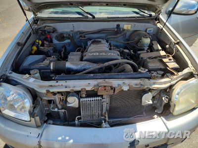 Zdjęcie 11 z 12 samochodu: 2004 TOYOTA TUNDRA SR5 VIN:5TBET34164S440947 - miniatura